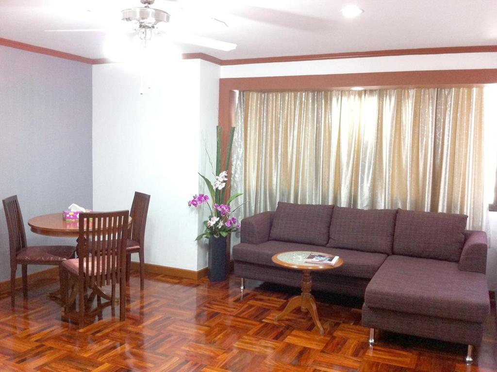 Omni Tower Syncate Suites Hotel