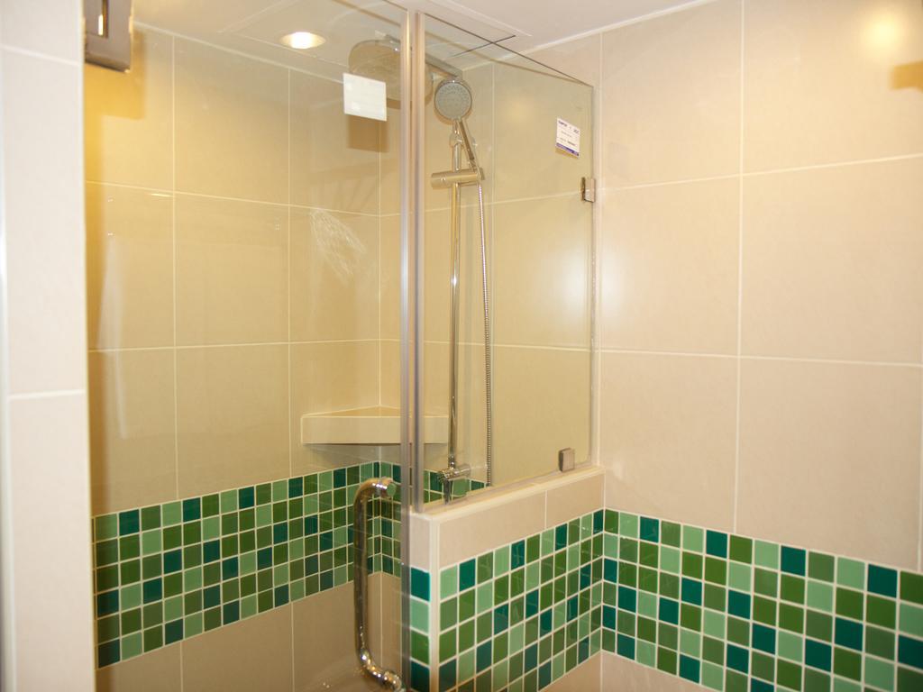 Omni Tower Syncate Suites Hotel