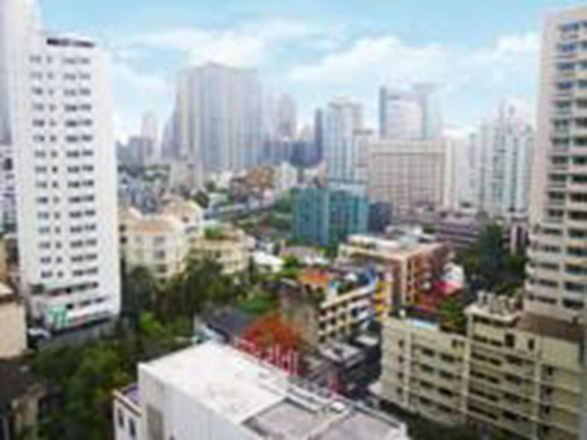 Omni Tower Syncate Suites Hotel